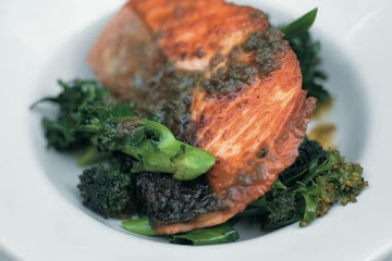 Pan-roasted salmon with purple sprouting broccoli and anchovy-rosemary sauce