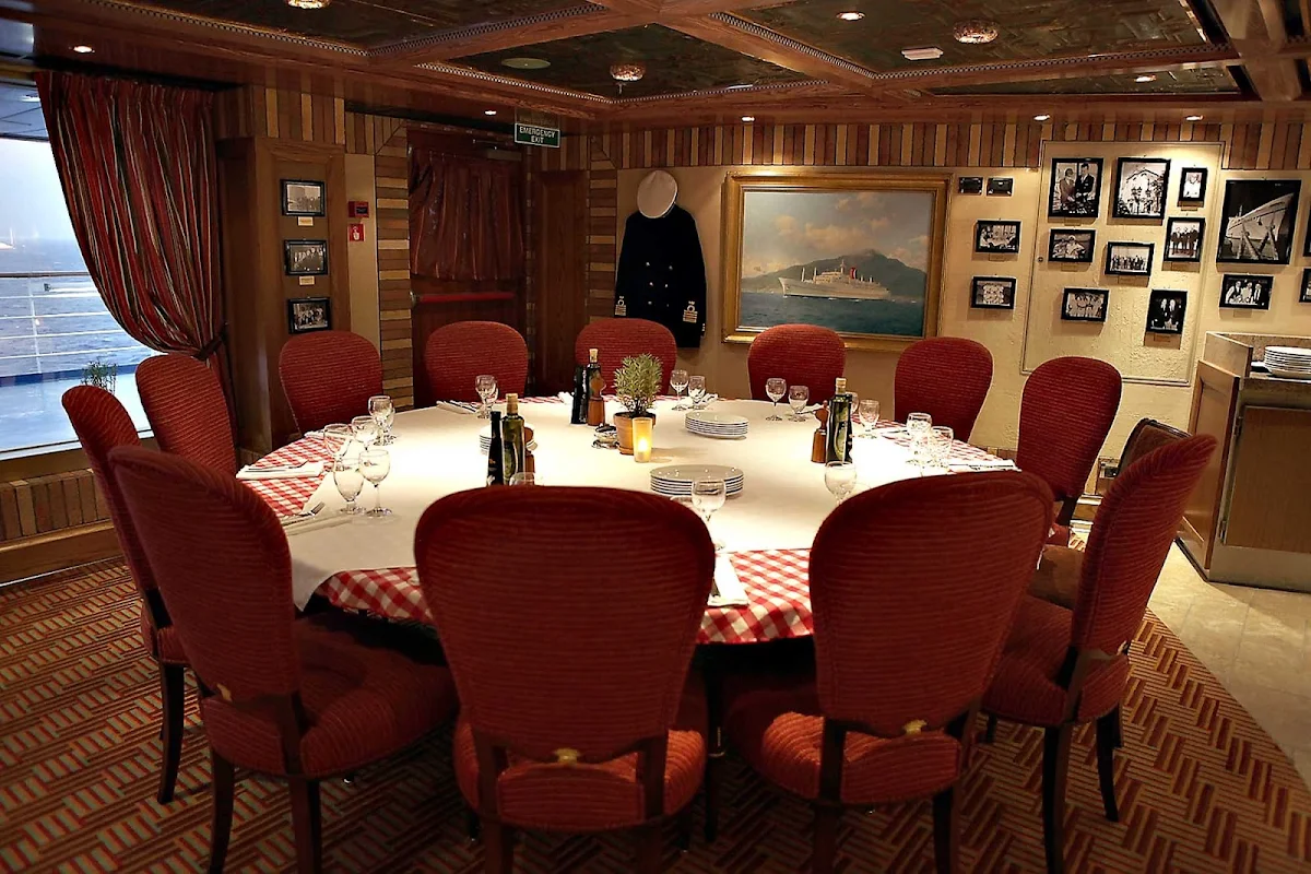 Carnival-Cruise-Lines-dining-Cucina-Del-Capitano-seating - Dine at the Captain’s Table of Cucina del Capitano during your Carnival cruise.