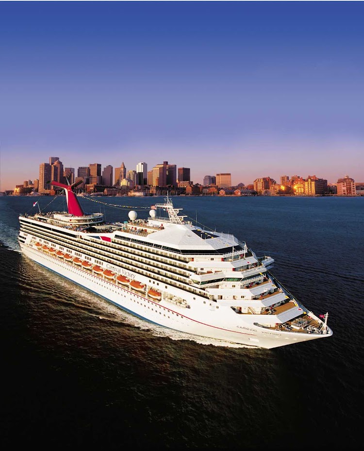 Carnival Victory sailing out of the Port of Miami toward a Caribbean destination.