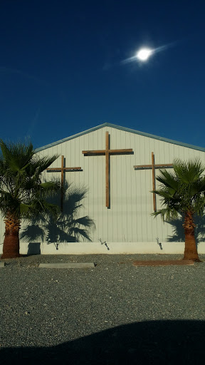 Three Crosses On Palms