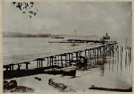 Steiger en boten op het meer Danau Lauttawar