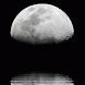 Waxing Gibbous Reflect In Wate