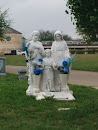 Mary, John and Family Statue