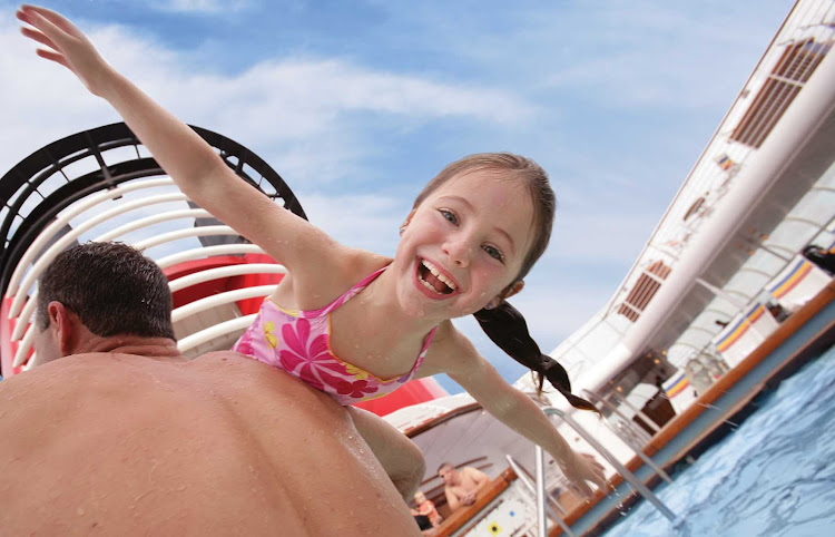 Having fun in the Family Pool on deck 5 of sister ships Disney Magic and Disney Wonder.