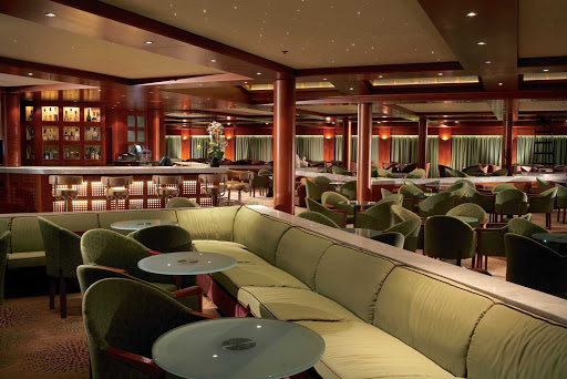Get comfortable, enjoy the atmosphere and a have a drink in the Rendezvous Bar onboard Celebrity Century.
