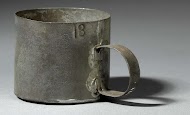 Maat van 1/4 oliemaatje met handvat