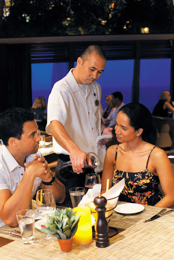 Norwegian-Epic-LaCucina-Couple - After a day in port, settle in for a romantic Italian dinner at La Cucina, a casual Italian trattoria on Norwegian Epic.