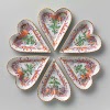 Set of six small heart-shaped dishes