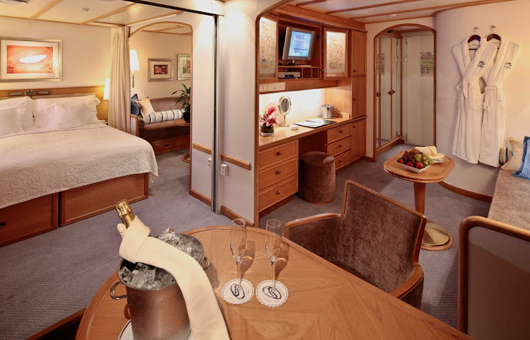 At 390 square feet, the Commodore Suite on your SeaDream cruise features his and hers bathrooms and a dining area for four.