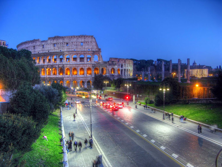 A color-enhanced view of the Colosseum in Rome at dusk. 