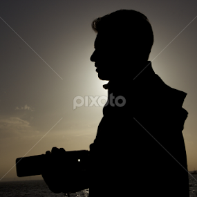 Sunset Silhouette  by David Veitch - People Portraits of Men