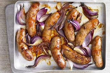 Sticky sausages with potato sweetcorn salad