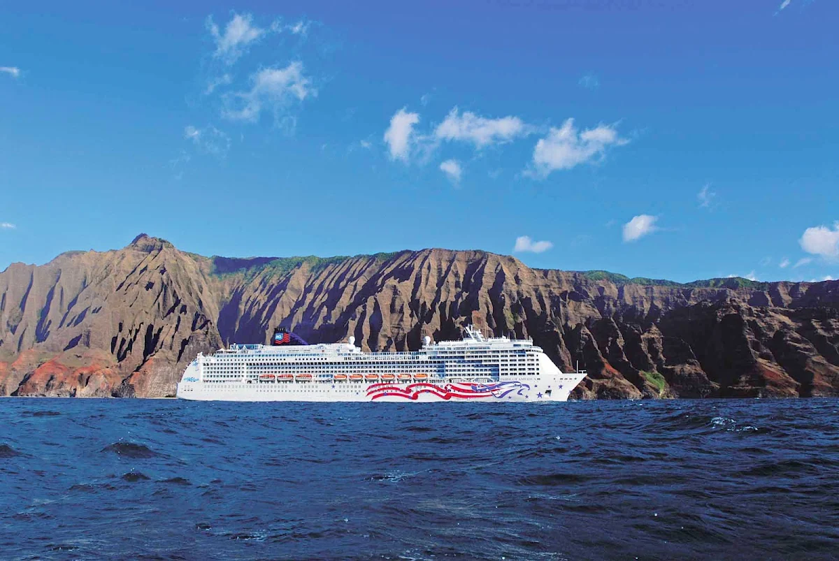 Norwegian-Pride-Of-America-Napali-Coast-1 - Cruise to Kauai, Hawaii, and experience the beauty of Na Pali Coast's green cliffs and splendid waterfalls.