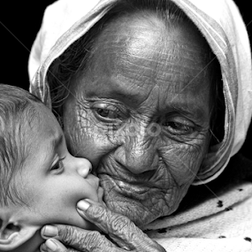 Tender love through ages by Ratnajit Choudhury - Black & White Portraits & People