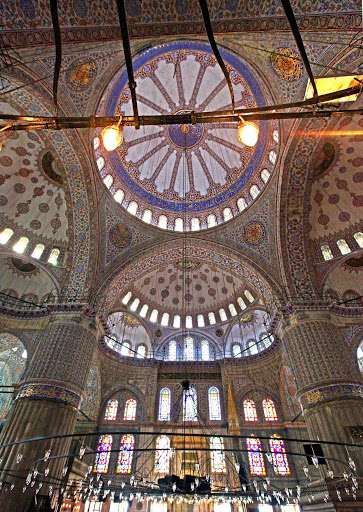 Sultan-Ahmed-Mosque-Istanbul-interior-cupola - The cascading domed ceiling and blue-tiled walls make the 400-year-old Sultan Ahmed Mosque, or Blue Mosque, one of the most beautiful sites in Istanbul, Turkey.