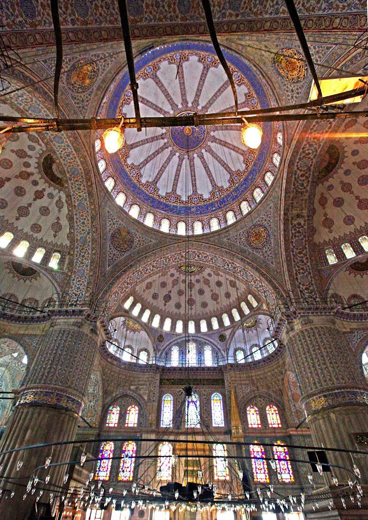 The cascading domed ceiling and blue-tiled walls make the 400-year-old Sultan Ahmed Mosque, or Blue Mosque, one of the most beautiful sites in Istanbul, Turkey.