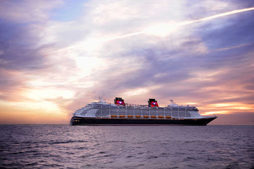 Disney-Dream-at-sea-2 - Disney Dream against the backdrop of a Caribbean sunset.