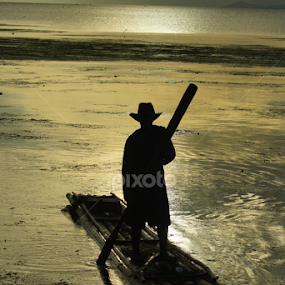 Fisherman on his bamboo raft by Cesar Cambay - Landscapes Waterscapes